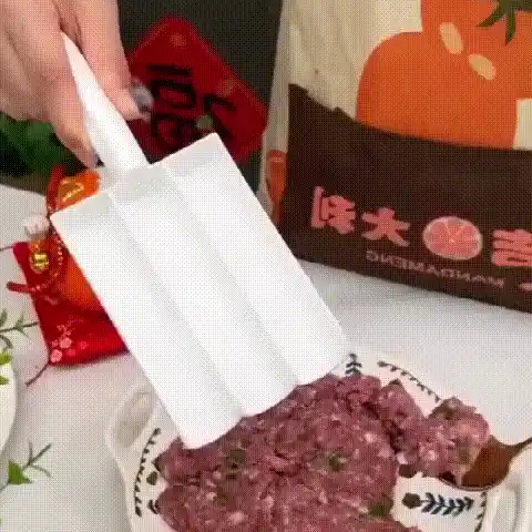Meatball Maker in action